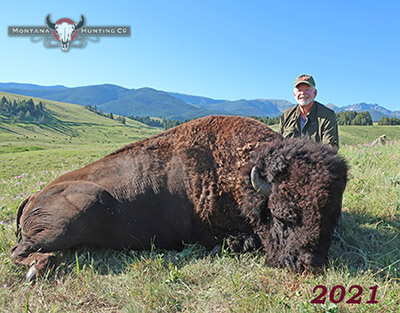 Hunter with his Trophy Bison