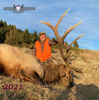 Hunter with his elk