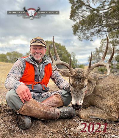 Hunter with his deer